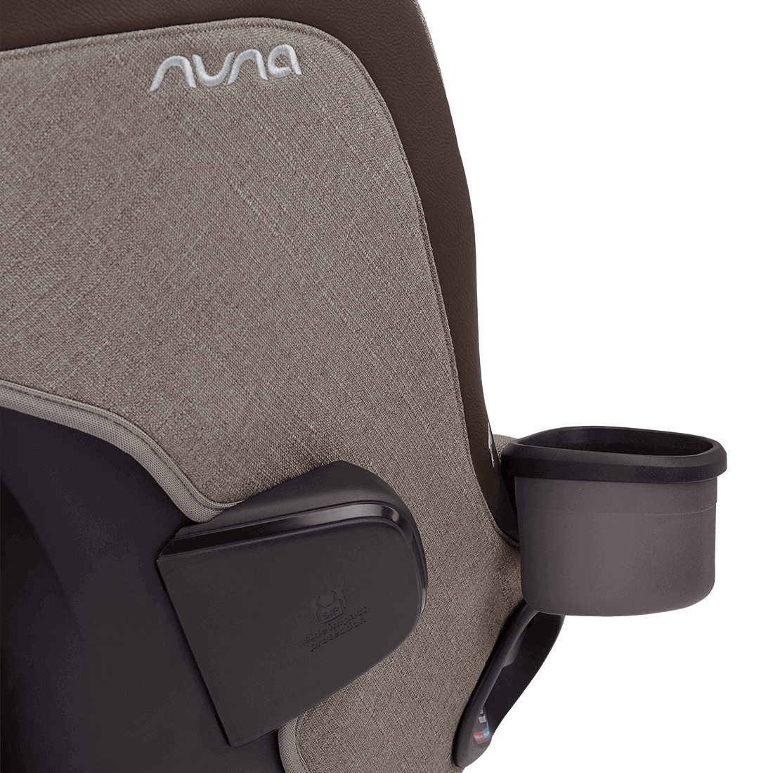 Close-up of the Nuna REVV maxx Cedar headrest wing showing the black Aeroflex side impact protection SIP pod beside a cup holder