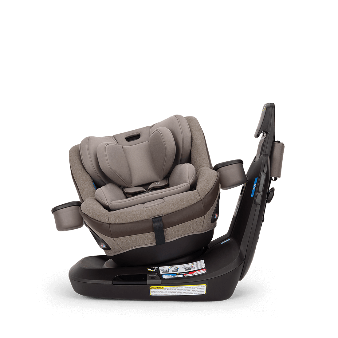 Nuna REVV maxx rotating convertible car seat in Cedar turned toward the side in Singapore, showing the one-handed 360 degree swivel with the tether arm extended