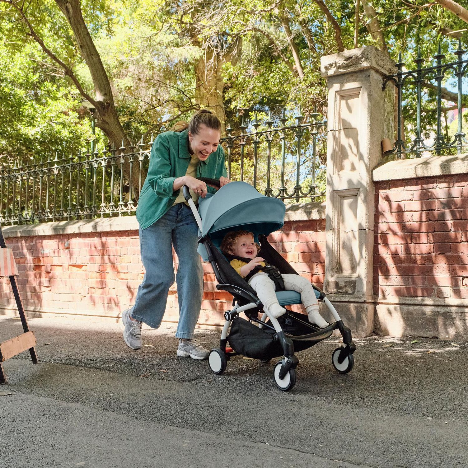 A parent out and about with the Stokke YOYO³ stroller